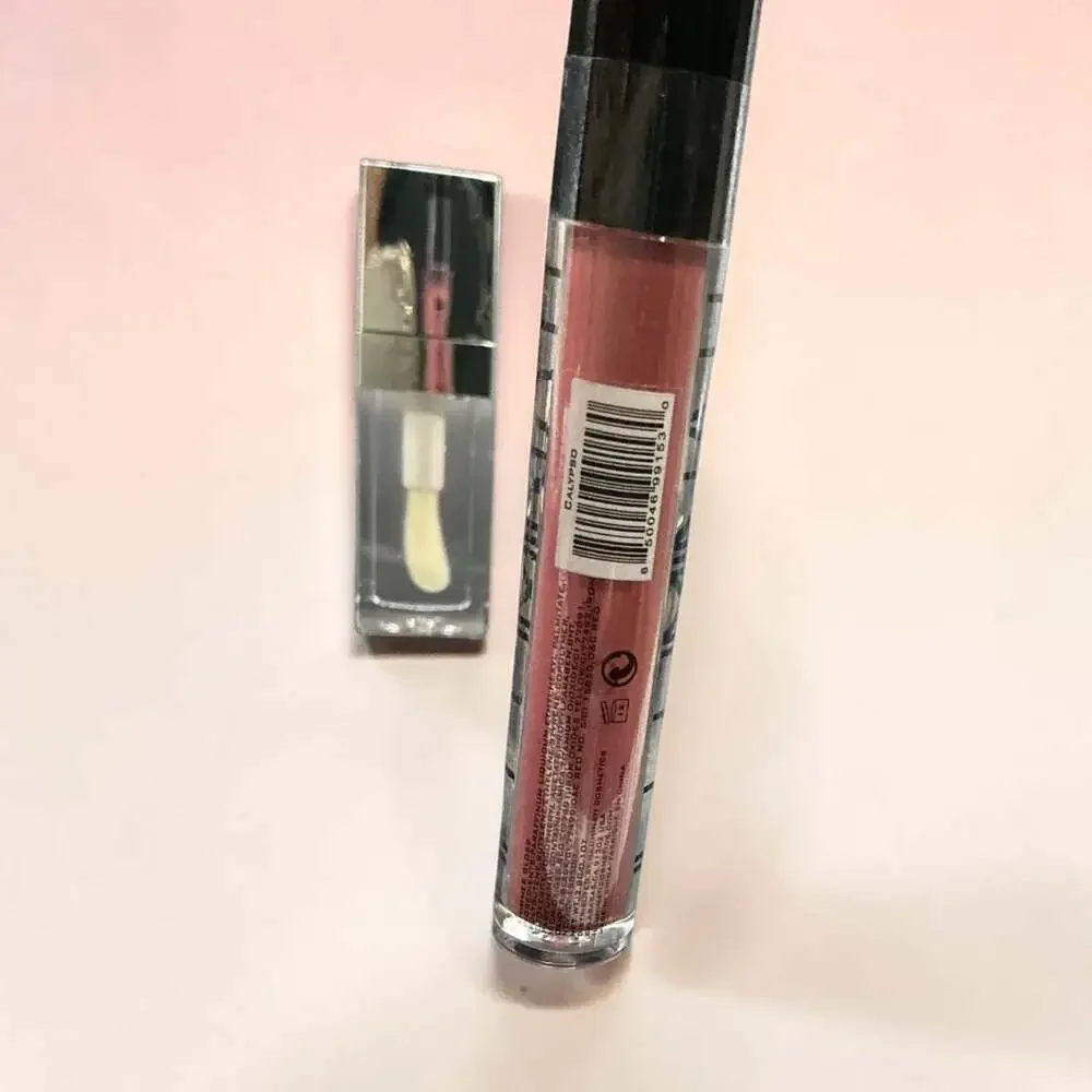 Illuminati Cosmetics Glowing Lip Oil in Crystal and Shimmer Lip Gloss in Calypso